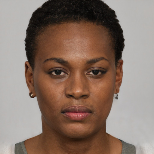 Neutral black young-adult female with short  black hair and brown eyes