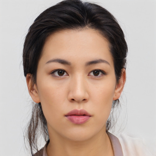 Neutral asian young-adult female with medium  brown hair and brown eyes