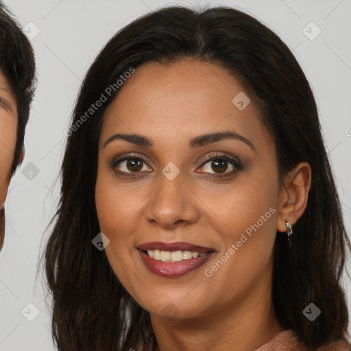 Joyful latino young-adult female with medium  brown hair and brown eyes