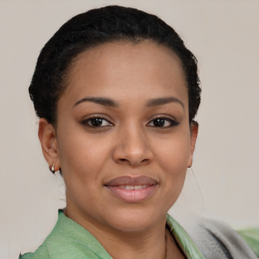 Joyful white young-adult female with short  black hair and brown eyes