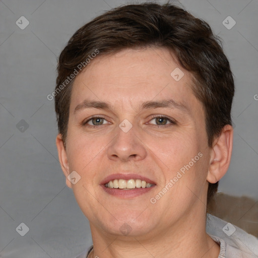 Joyful white adult female with short  brown hair and brown eyes