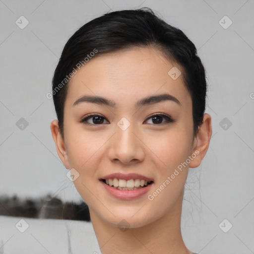 Joyful asian young-adult female with medium  black hair and brown eyes