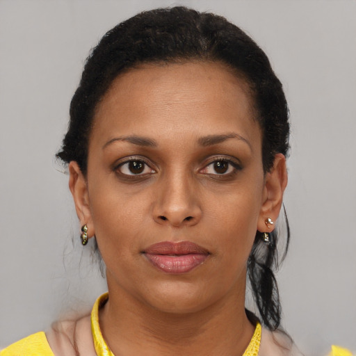 Neutral black young-adult female with short  brown hair and brown eyes