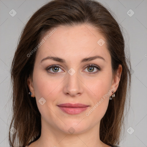 Joyful white young-adult female with medium  brown hair and green eyes