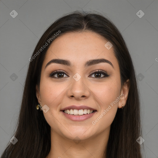 Joyful white young-adult female with long  brown hair and brown eyes