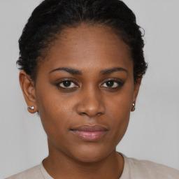 Neutral black young-adult female with short  brown hair and brown eyes