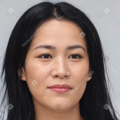 Joyful asian young-adult female with long  brown hair and brown eyes