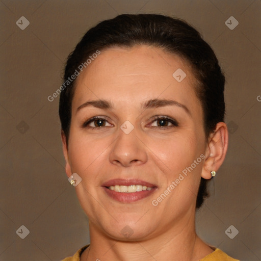 Joyful white adult female with short  brown hair and brown eyes