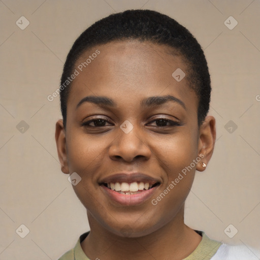 Joyful black young-adult female with short  black hair and brown eyes