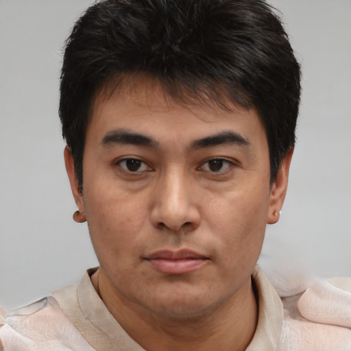 Neutral white young-adult male with short  brown hair and brown eyes