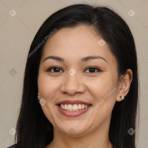 Joyful asian young-adult female with long  brown hair and brown eyes