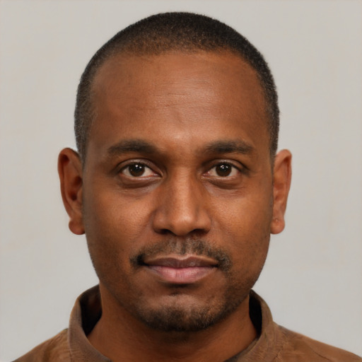 Neutral black young-adult male with short  brown hair and brown eyes