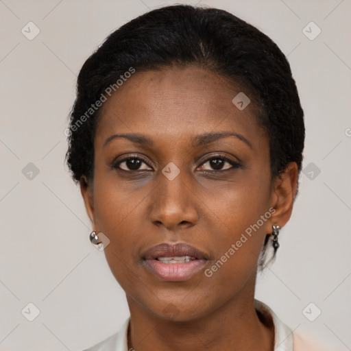 Neutral black young-adult female with short  brown hair and brown eyes