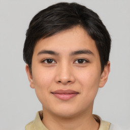 Joyful asian young-adult female with short  brown hair and brown eyes