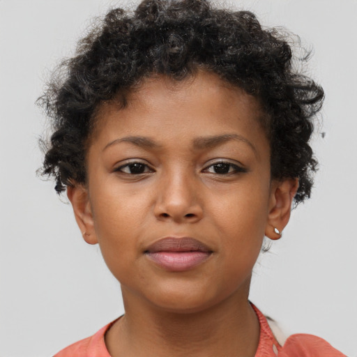 Neutral black young-adult female with short  brown hair and brown eyes