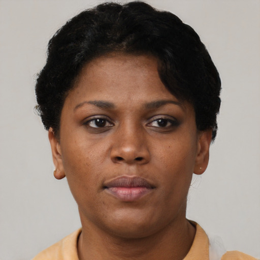 Neutral black young-adult female with short  brown hair and brown eyes