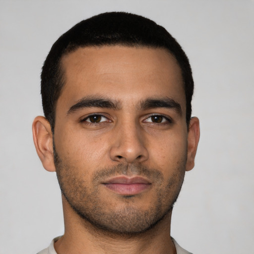 Neutral latino young-adult male with short  brown hair and brown eyes