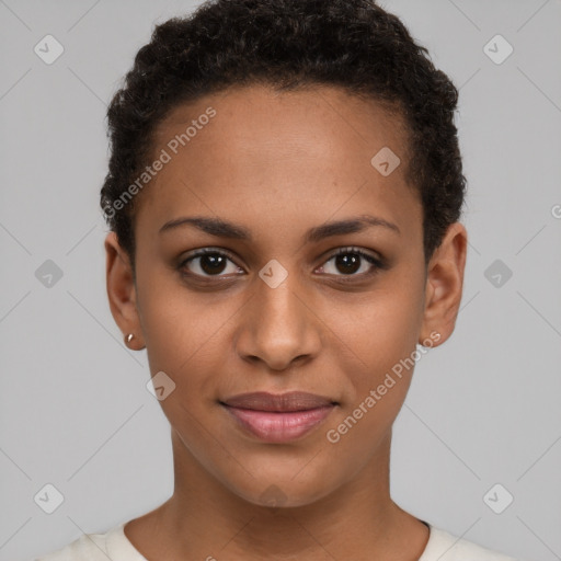 Joyful black young-adult female with short  brown hair and brown eyes