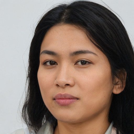 Neutral latino young-adult female with medium  black hair and brown eyes