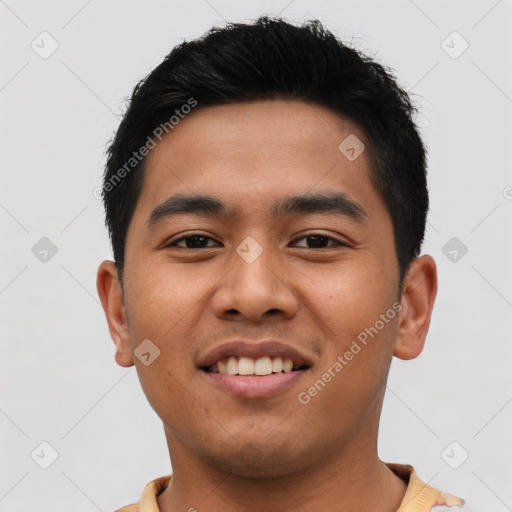 Joyful asian young-adult male with short  black hair and brown eyes