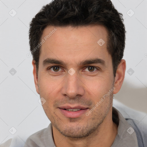 Joyful white adult male with short  brown hair and brown eyes