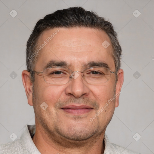 Joyful white adult male with short  brown hair and brown eyes