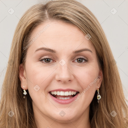 Joyful white young-adult female with long  brown hair and grey eyes