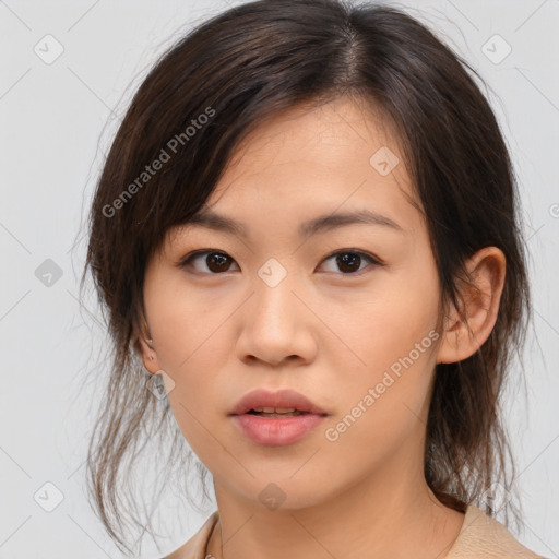 Neutral asian young-adult female with medium  brown hair and brown eyes