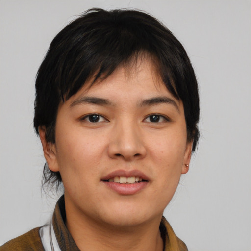 Joyful asian young-adult female with short  brown hair and brown eyes