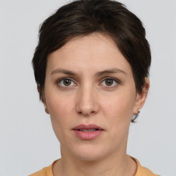 Neutral white young-adult female with short  brown hair and brown eyes