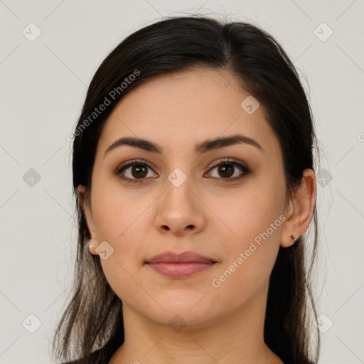 Neutral white young-adult female with long  brown hair and brown eyes