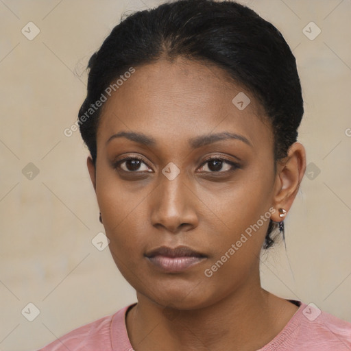 Neutral black young-adult female with short  black hair and brown eyes