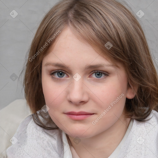 Joyful white child female with medium  brown hair and blue eyes