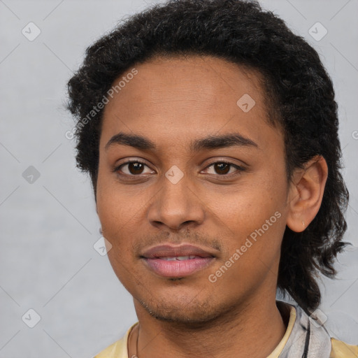 Joyful latino young-adult female with short  black hair and brown eyes