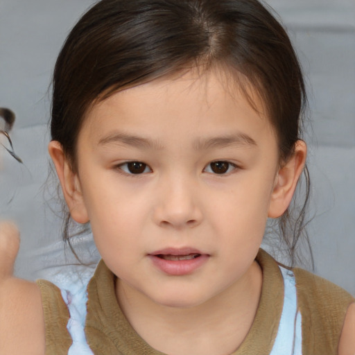 Neutral white child female with medium  brown hair and brown eyes