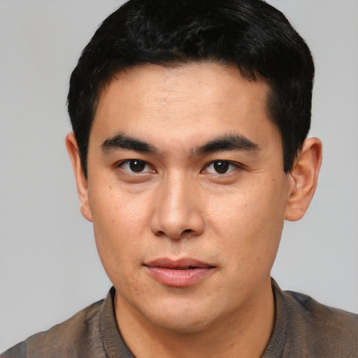 Neutral asian young-adult male with short  black hair and brown eyes