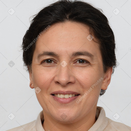 Joyful white adult female with short  brown hair and brown eyes