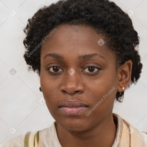 Neutral black young-adult female with short  brown hair and brown eyes