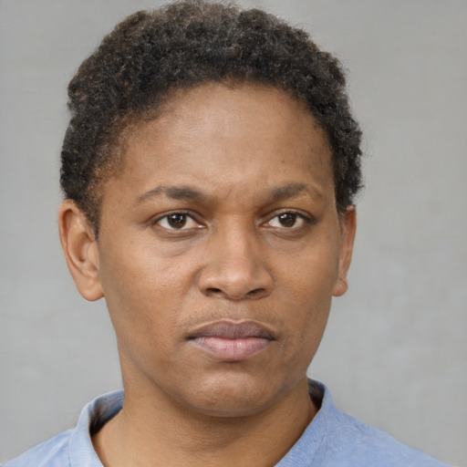 Neutral black adult female with short  brown hair and brown eyes