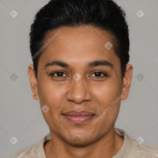 Joyful latino adult male with short  black hair and brown eyes