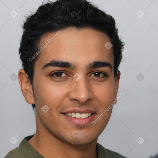 Joyful latino young-adult male with short  brown hair and brown eyes