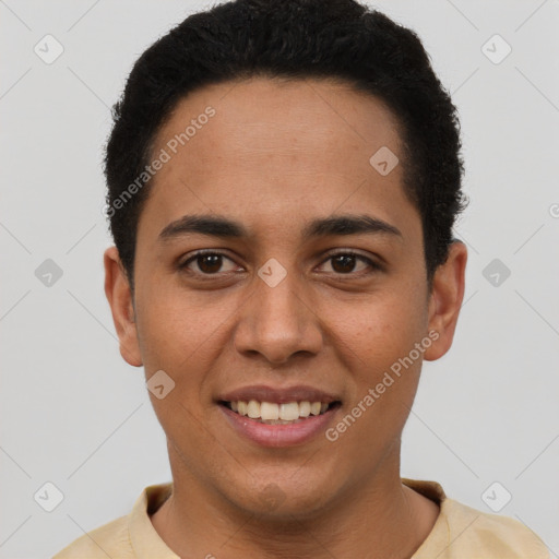 Joyful latino young-adult male with short  brown hair and brown eyes