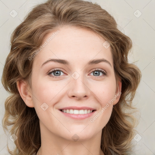 Joyful white young-adult female with medium  brown hair and blue eyes