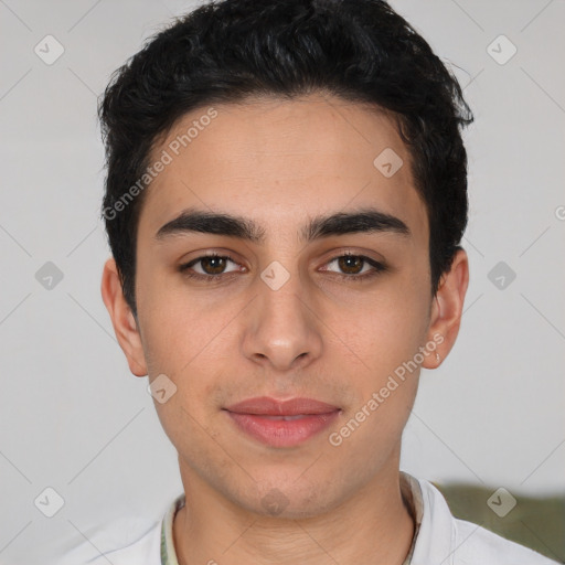 Joyful white young-adult male with short  black hair and brown eyes