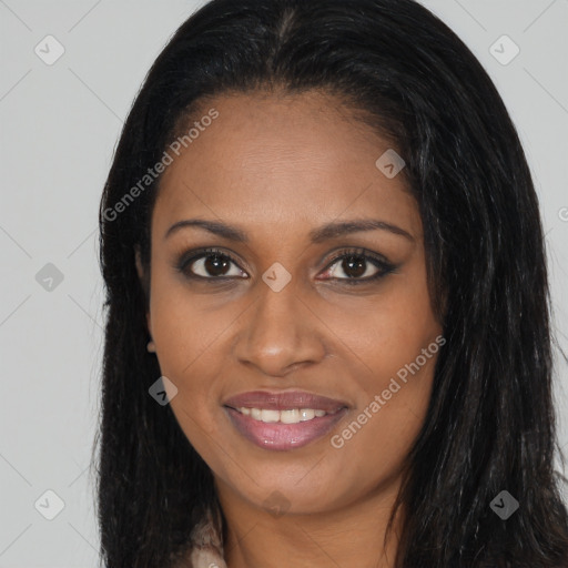 Joyful black young-adult female with long  brown hair and brown eyes