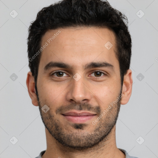 Joyful white young-adult male with short  black hair and brown eyes