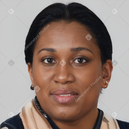 Joyful latino young-adult female with short  black hair and brown eyes