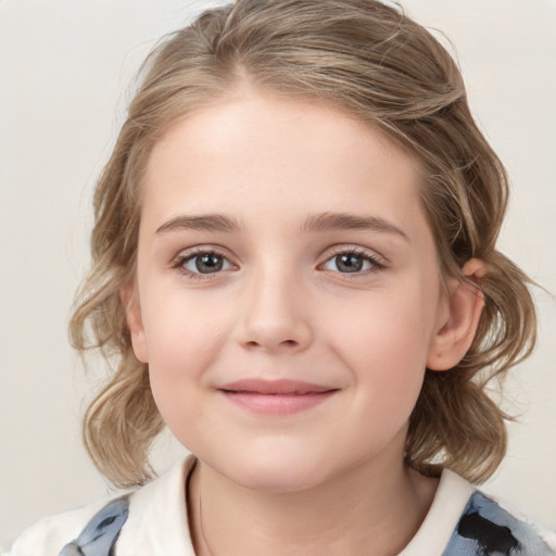 Joyful white child female with medium  brown hair and grey eyes