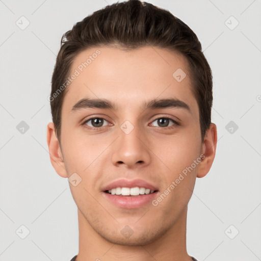 Joyful white young-adult male with short  brown hair and brown eyes