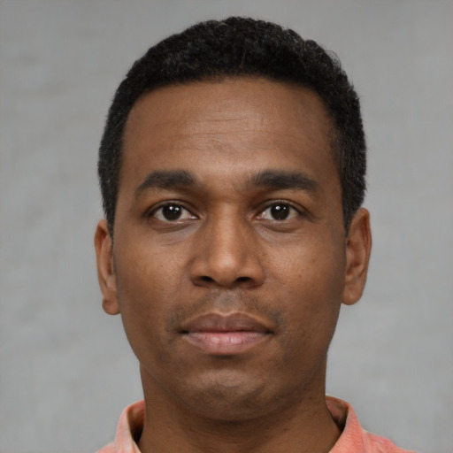 Neutral black young-adult male with short  black hair and brown eyes